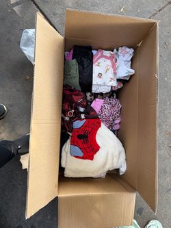 Boxes of baby clothes