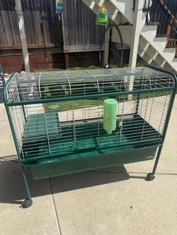 Large cage for sale asking 60