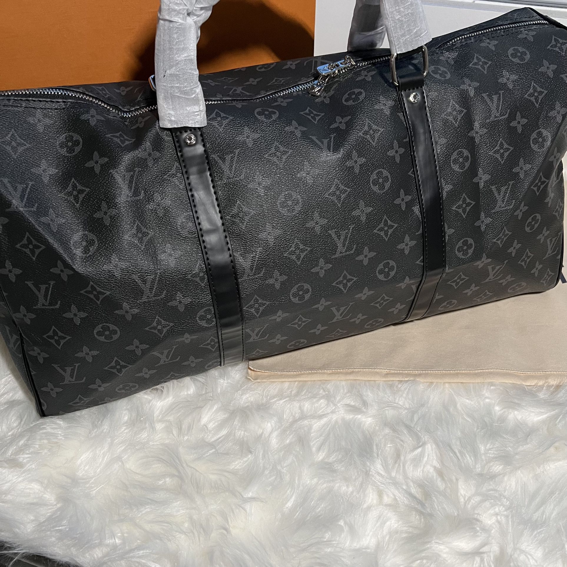 Louis Vuitton Small Duffle Bag for Sale in Ind Crk Vlg, FL - OfferUp