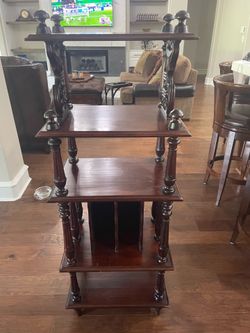 Antique Victorian-style carved etagere with turned columns