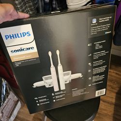 This Electric Toothbrush His Is New Hers I Used It But U Can Get New Heads Don't Need 