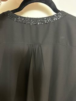 $15  Blusa Negra XL manga larga con lentejuela