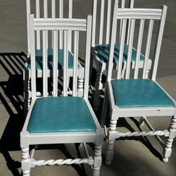 4 Carved Solid Wood Chairs 