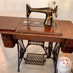 Antique Singer Treadle Sewing Machine in cabinet, vintage