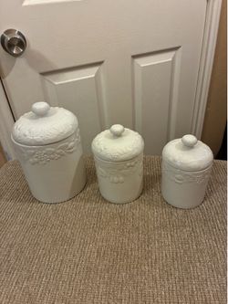 Vintage Gibson white ceramic kitchen canister with an embossed fruit decoration