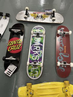 Skateboard trucks wheels bearings decks grip tools