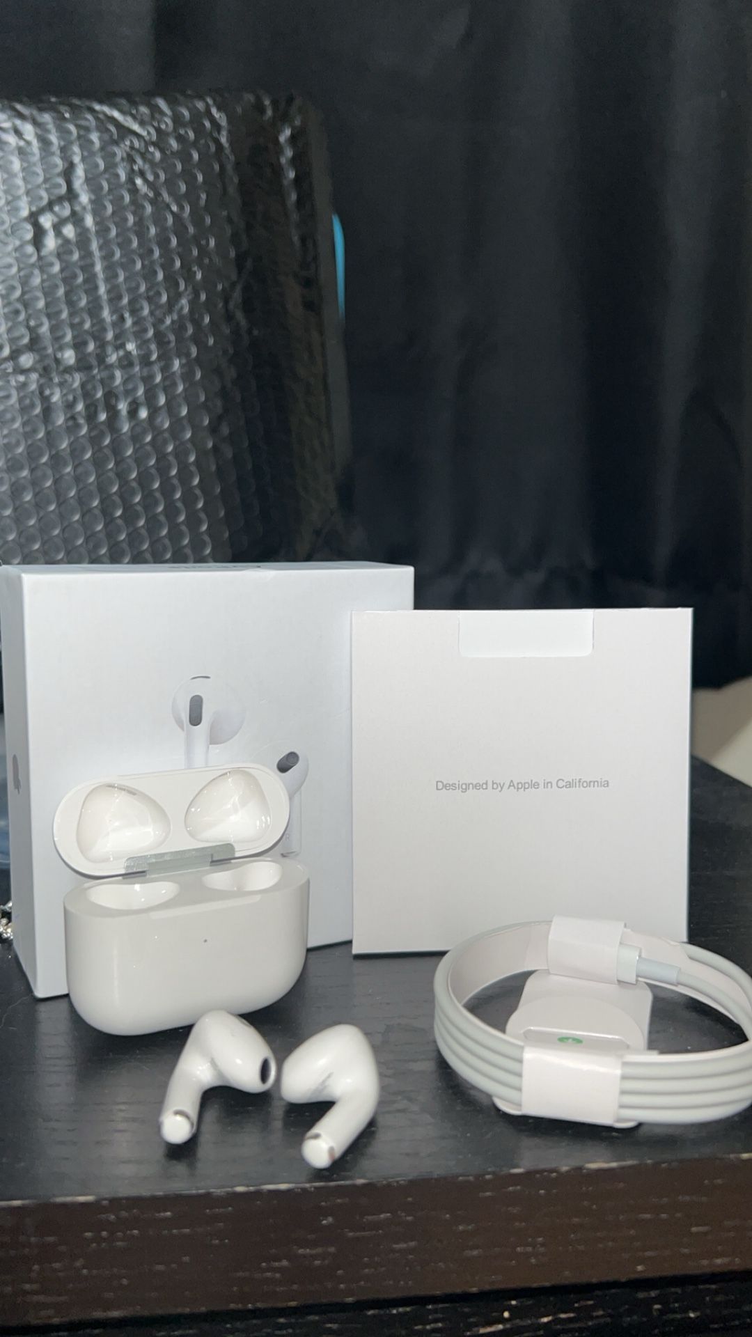 Apple AirPods (3rd Generation) Wireless Earbuds with MagSafe Charging Case.