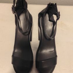 Black platforms with ankle strap