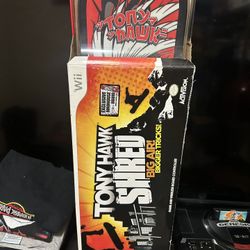 Tony Hawk Wii Skateboard And Game 