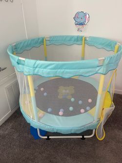 Toddler trampoline with safety net