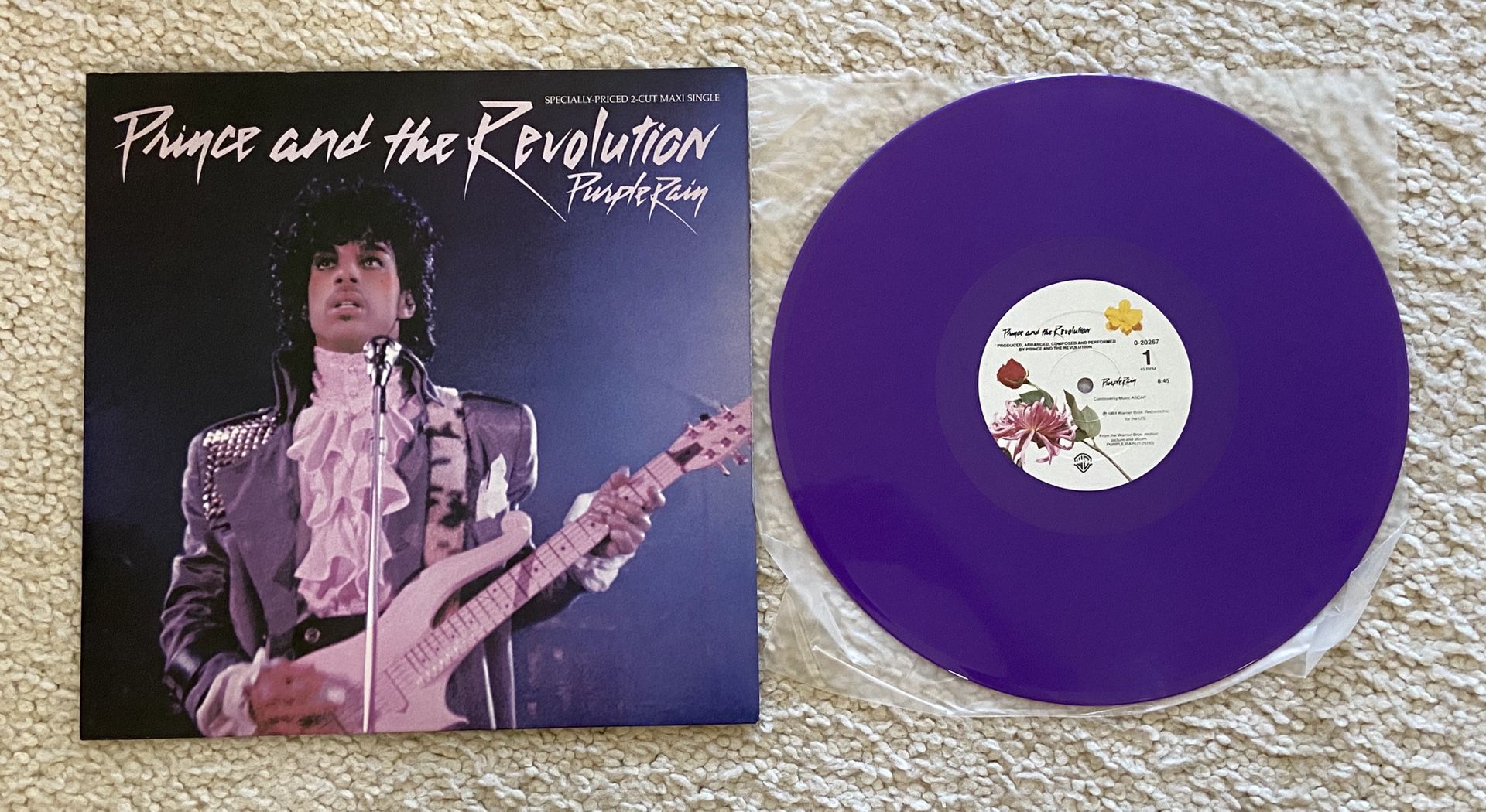 Prince and The Revolution “Purple Rain” vinyl 12” Limited Edition Purple vinyl 1984 Warner Records Original Pressing gorgeous like new pristine colle