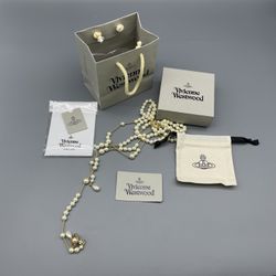 Vivienne Westwood Irregular Three Row Pearl Bas Relief Choker in gold