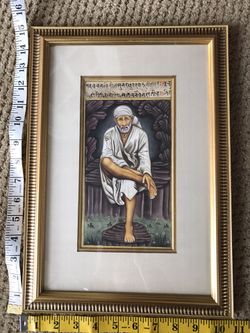 Frame with photo of god/ gurus