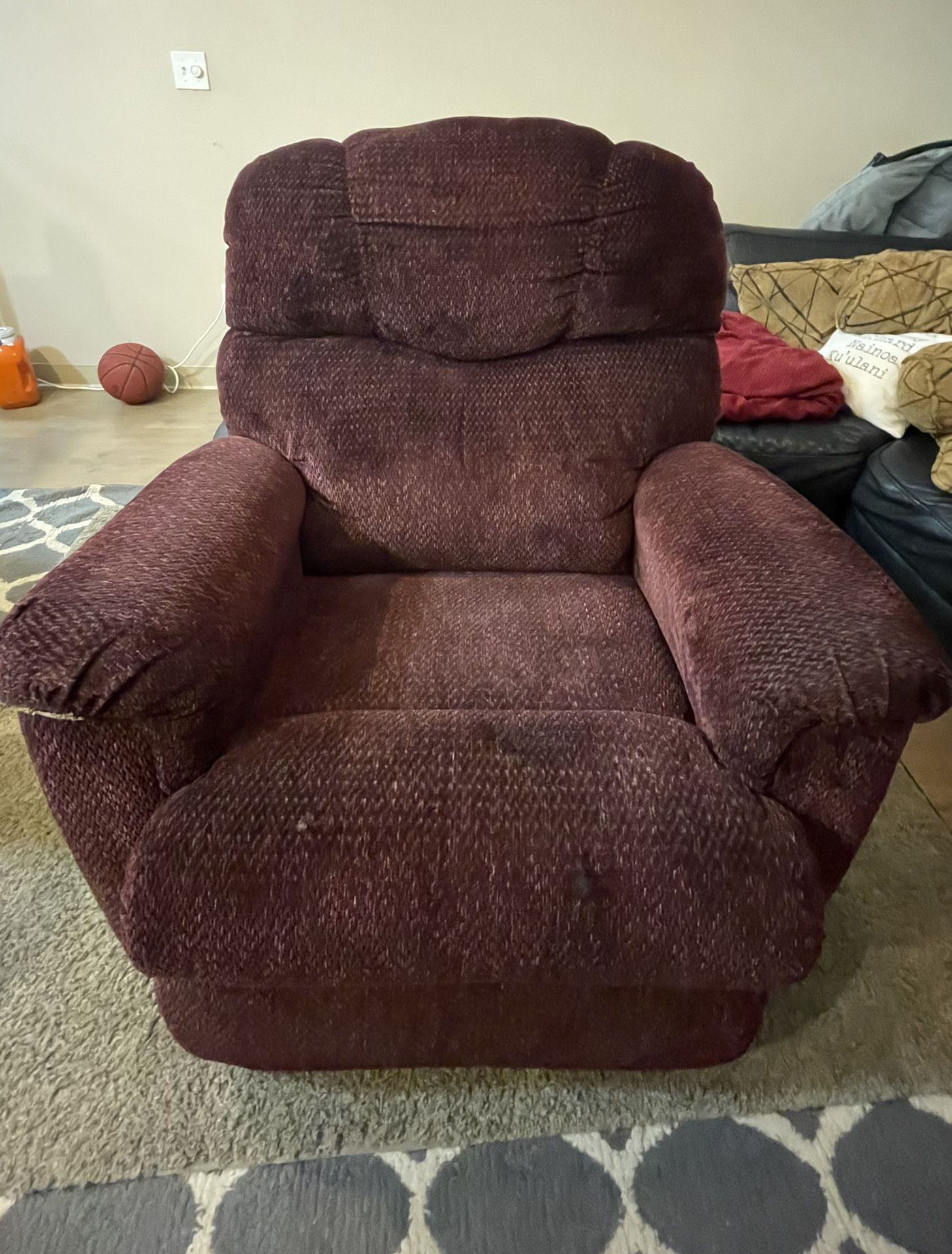 Burgundy recliner/rocking chair