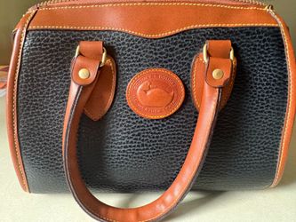 Dooney and Burke  never used purse