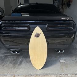 Small wooden skimboard