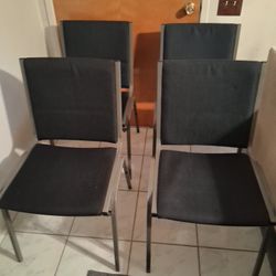 4 Dark Blue Stackable Chairs 