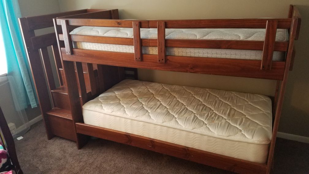 Twin bunk beds with stairs