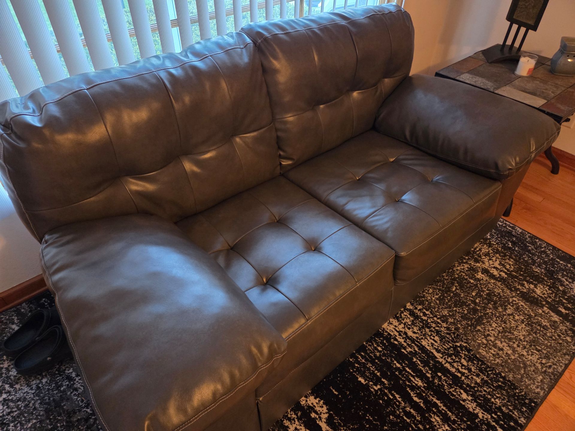 Leather Love Seat with tables and Lamp