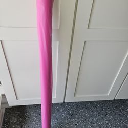 Roll of pink tablecloth material