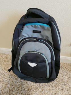 Travel backpack with insulated pocket