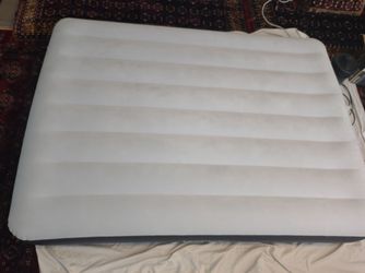 Queen-size airbed with USB pump