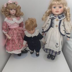 Three Beautiful Collectable Porcelain Dolls