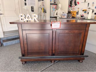 Cherrywood bar     Built-in storage, stemware racks, or wine bottle holders