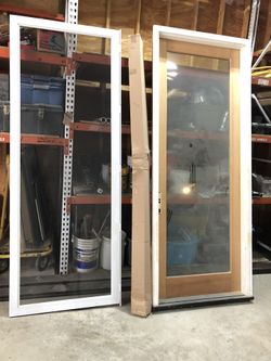 3’ 0” X 8’ 0” Pre Hung Fir Door With Aluminum Screen Door.