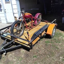 The motorcycle And Traliorit Comes With Two Motors