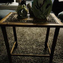 Vintage bamboo coffee table with three glass decor on it included
