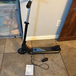 Electric Scooter for Kids Age 6-10, Kick-Start Boost Scooter with Adjustable Speed and Height, Flash Wheel & Deck Lights  Perfect Condition. Comes wit