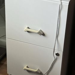 Two metal filing cabinets 