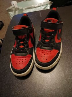 Boys Nike Court knock b r o u g h low with adjustable strap red and black good condition just need wiping down been packed up and Storage size 12C