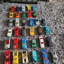 46 Hot Wheels and 2 boxes