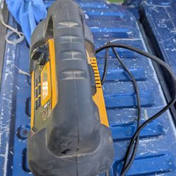 Charger to pass power to the cars and compressor light in very good condition.