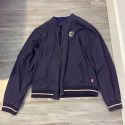 Marvels Eternals Navy blue bomber jacket with gold accents