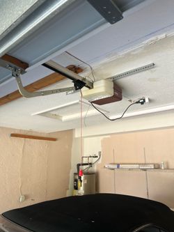 Garage Door Opener Broken Spring Off Track Replace Adjustment And Parts