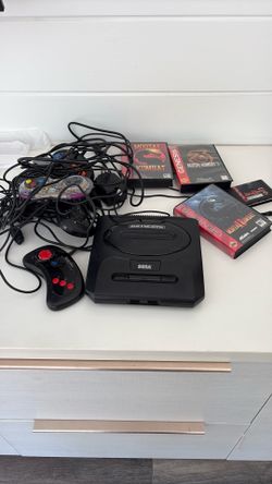 Sega Genesis with Mortal Kombat 1-3 (2 copies of MK2) and 4 controllers