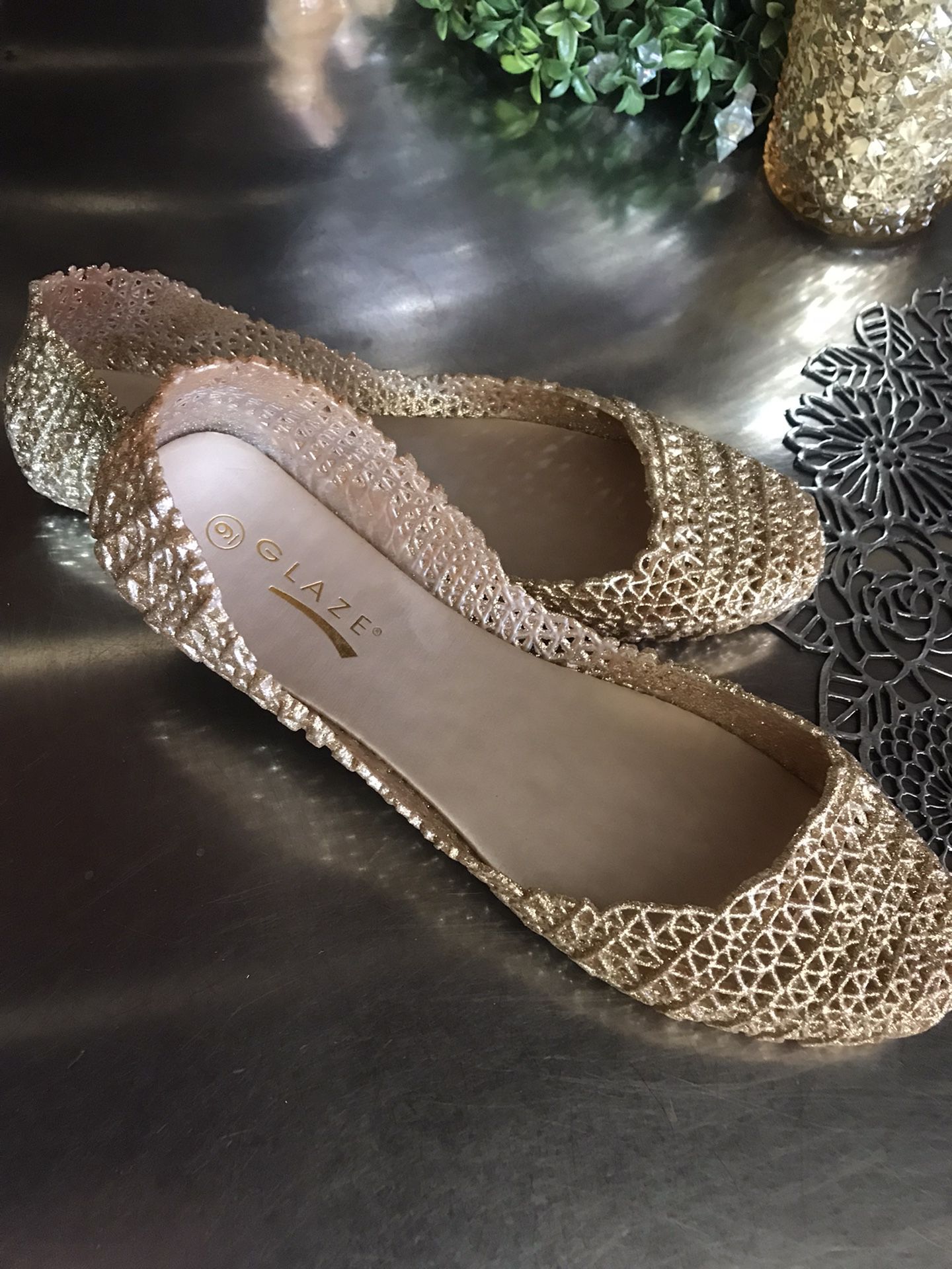 Size 9 Glittery gold Lacy closed toe jelly style flat shoe, never used