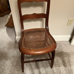 Antique Solid Wood with Woven Cane Wicker Rattan Seat Dining Side Accent Chair  Measurements are approximate. 32.5” h . 17” d. 16” w.   This was in my