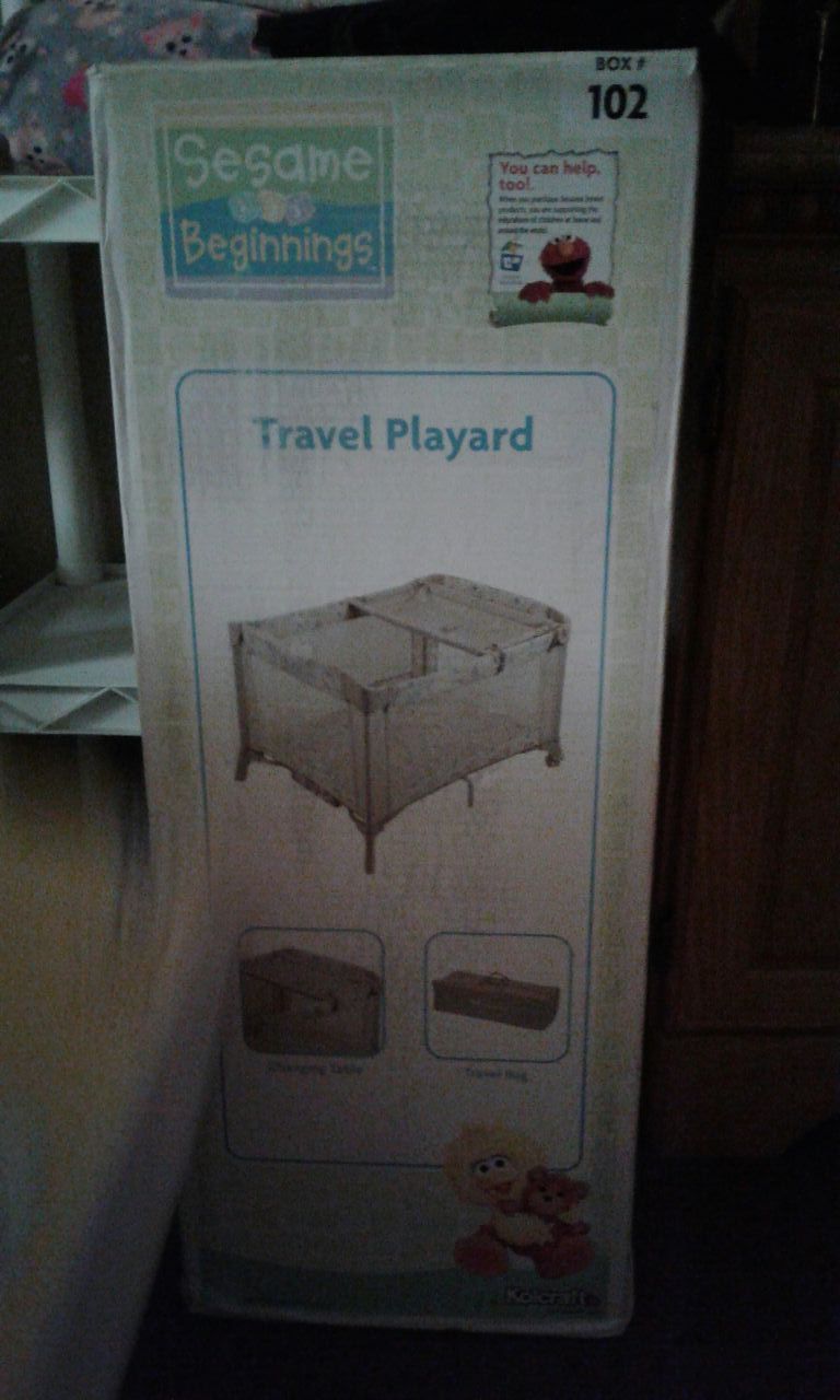 Kolcraft sesame beginnings travel playard