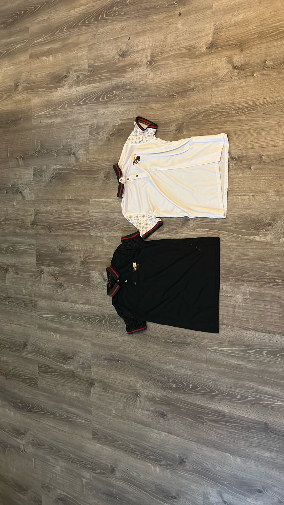 2 Gucci Shirts 1 For (125) Both For (255)