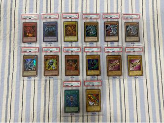 Lot Of 14 Grade PSA 9 & 8 Yugioh Cards.