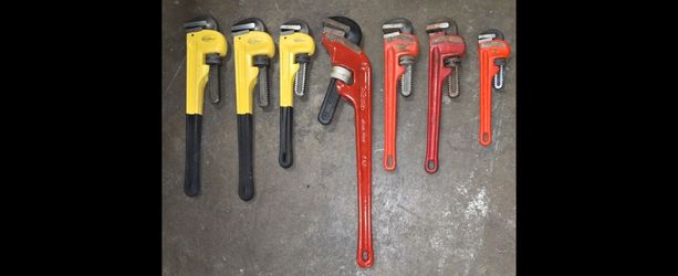 New Pipe Wrenches, 3 Yellow Aluminum, 4 Red Steel. $150.00