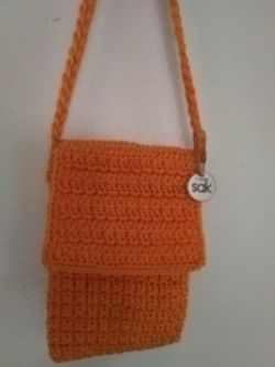The Sak bright orange crossbody purse