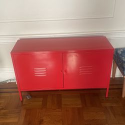 Red metal locker-style cabinet/TV stand