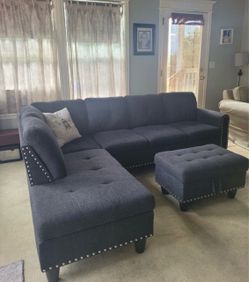 Charcoal linen sectional couch and ottoman