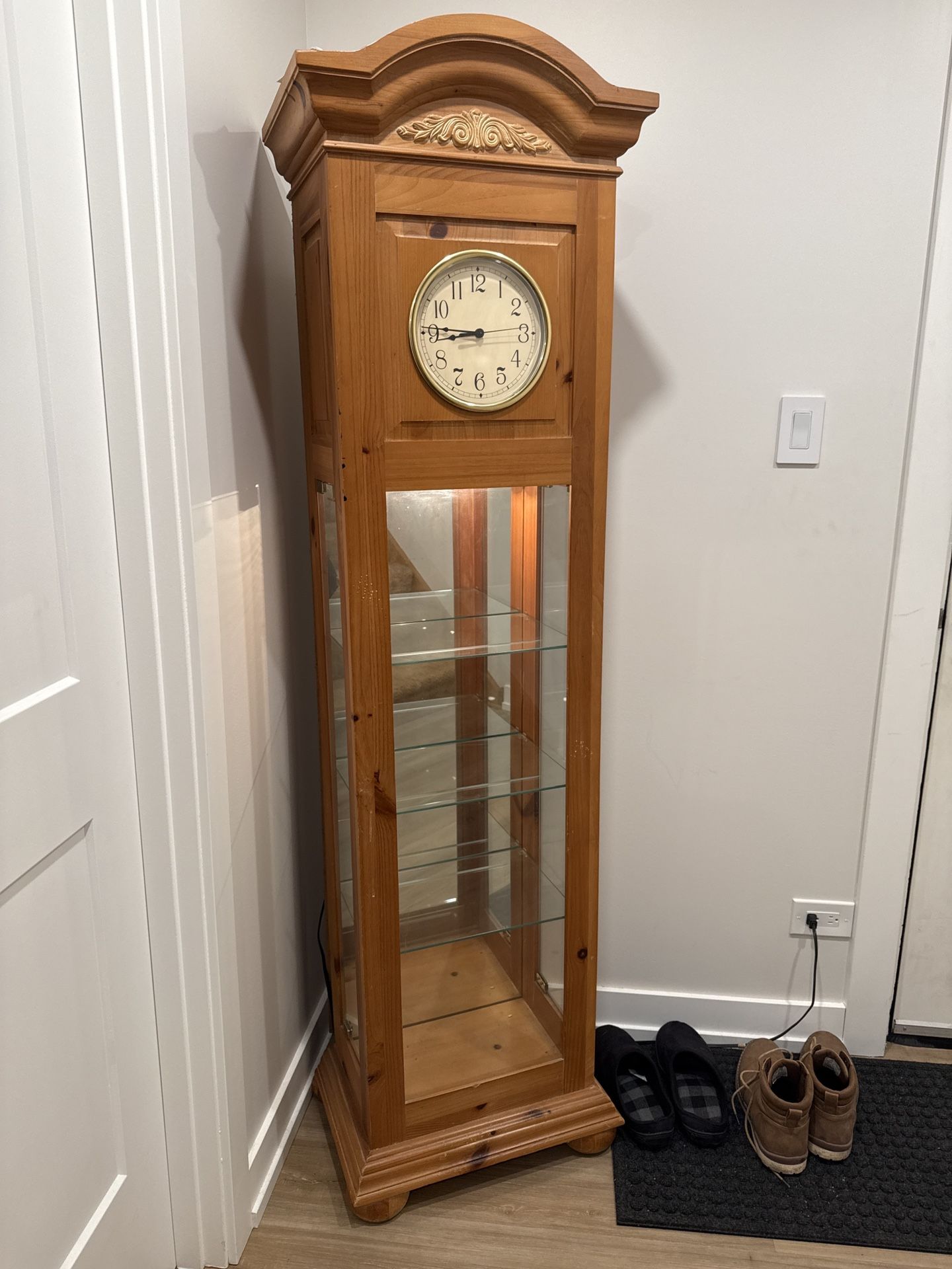 grandfather-style display cabinet clock