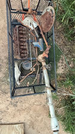 Falcon and Ford parts lot. 1964 Falcon steering box. Sway bar.